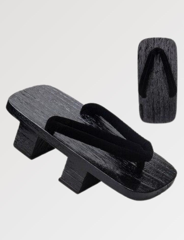 The pair of Japanese geta for men and women with black stained wood