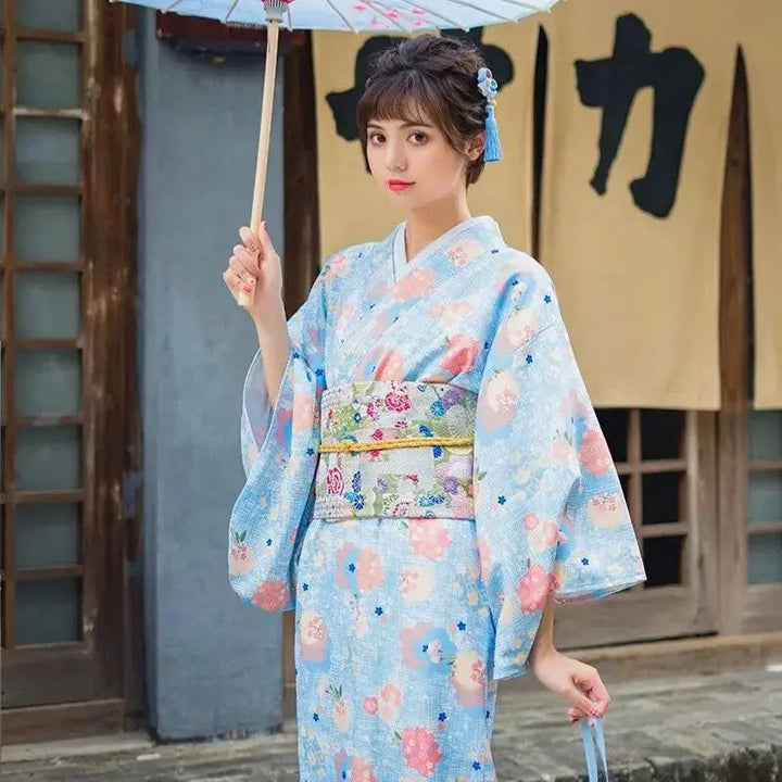 Traditional Japanese Kimono for Women in a sky blue color with cherry blossom prints