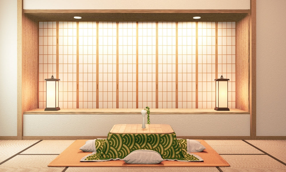 Traditional Japanese kotatsu heated table with green seigaiha blanket in a tatami room — the iconic Japanese heated table setup