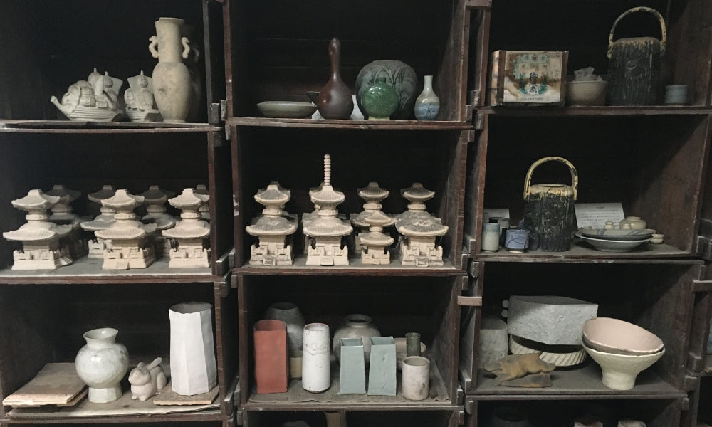 Shelves of Japanese ceramics in a pottery shop