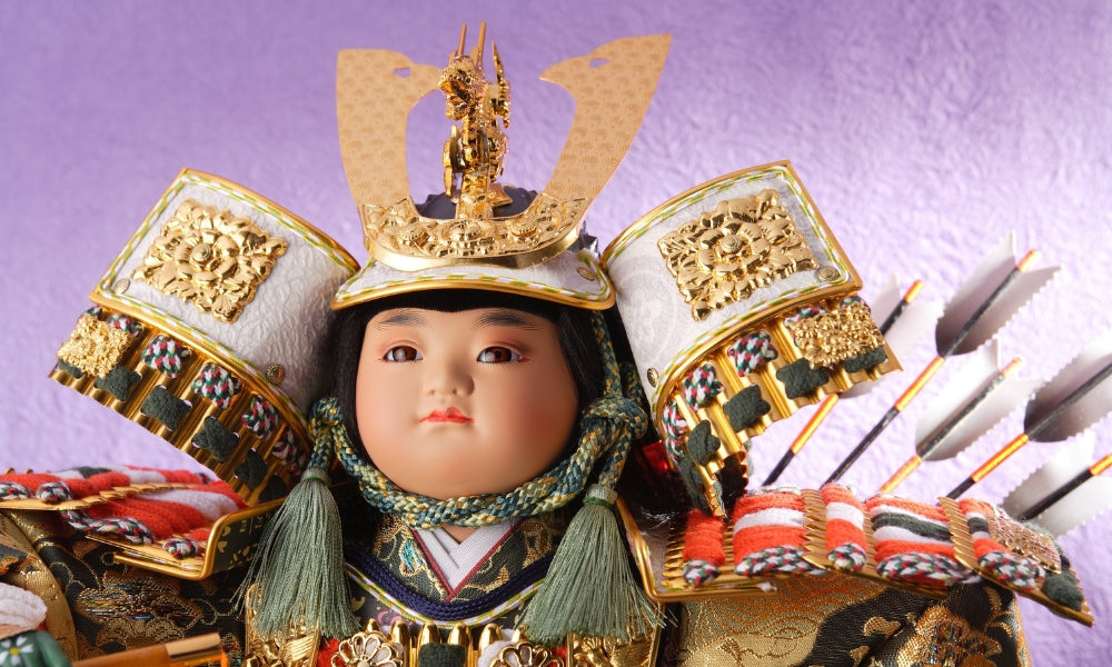 Complete Japanese samurai armor with gold kabuto helmet, red cord lacing, and full yoroi body armor — the armor of a samurai