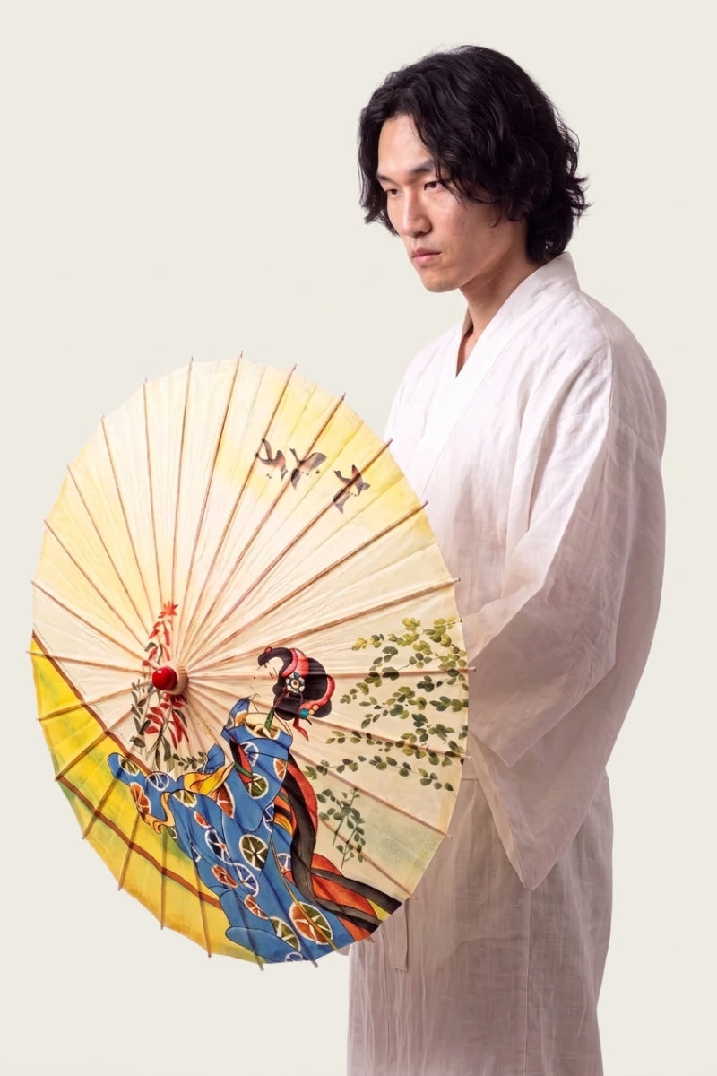 Japanese umbrella collection — traditional wagasa paper parasols with painted floral and landscape designs