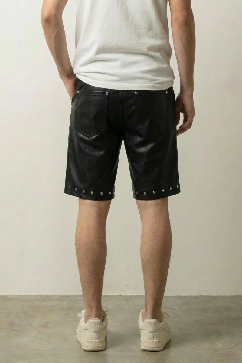 Black faux leather shorts styled edgy look