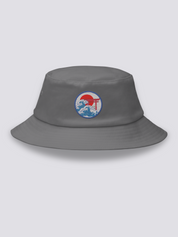 White bucket hat with an embroidered navy medallion of a red torii half-submerged in foaming waves under a red sun