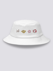 Khaki bucket hat with four embroidered icons in a row: an origami crane, geta sandals, a cherry blossom and a red koi carp