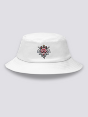 Khaki bucket hat with an embroidered white fox mask pierced vertically by a black katana blade, stylized smoke on both sides