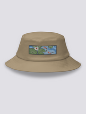 Grey bucket hat with an embroidered patch of two red and white koi carp among lily pads and a white lotus