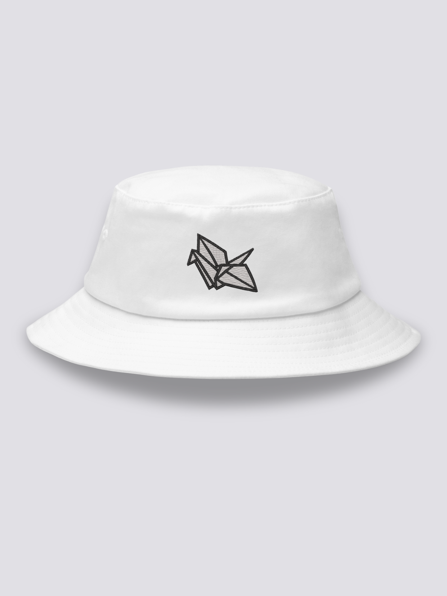 White bucket hat with a geometric white origami crane embroidered in fine black fold lines
