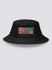 Black bucket hat with an embroidered patch of stone shrine steps under cherry blossom with two orange and white cats