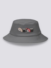Grey bucket hat with four embroidered sushi in a row: salmon nigiri, avocado maki, tuna nigiri and cucumber maki