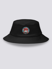 Black bucket hat with an embroidered medallion of a vermilion torii before Mount Fuji, framed by cherry blossom under a red sun