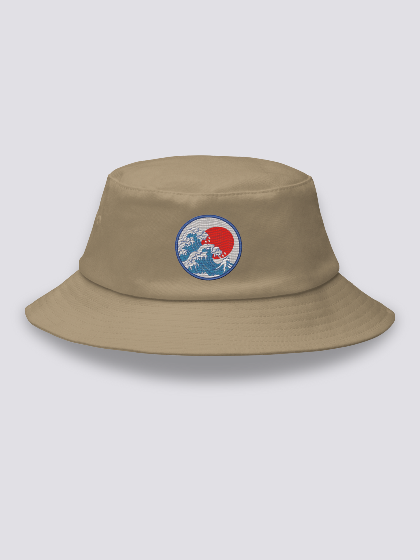 Grey bucket hat with an embroidered blue medallion of the Great Wave breaking beneath a full red sun