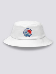 Khaki bucket hat with an embroidered blue medallion of the Great Wave breaking beneath a full red sun