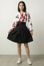 Camellia print Japanese kimono dress with crossover top, long bell sleeves, red ribbon tie and high-waist pleated skirt