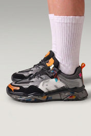 Black Japanese fashion sneakers 'Hekinan', worn on foot with white socks — Japanese streetwear style