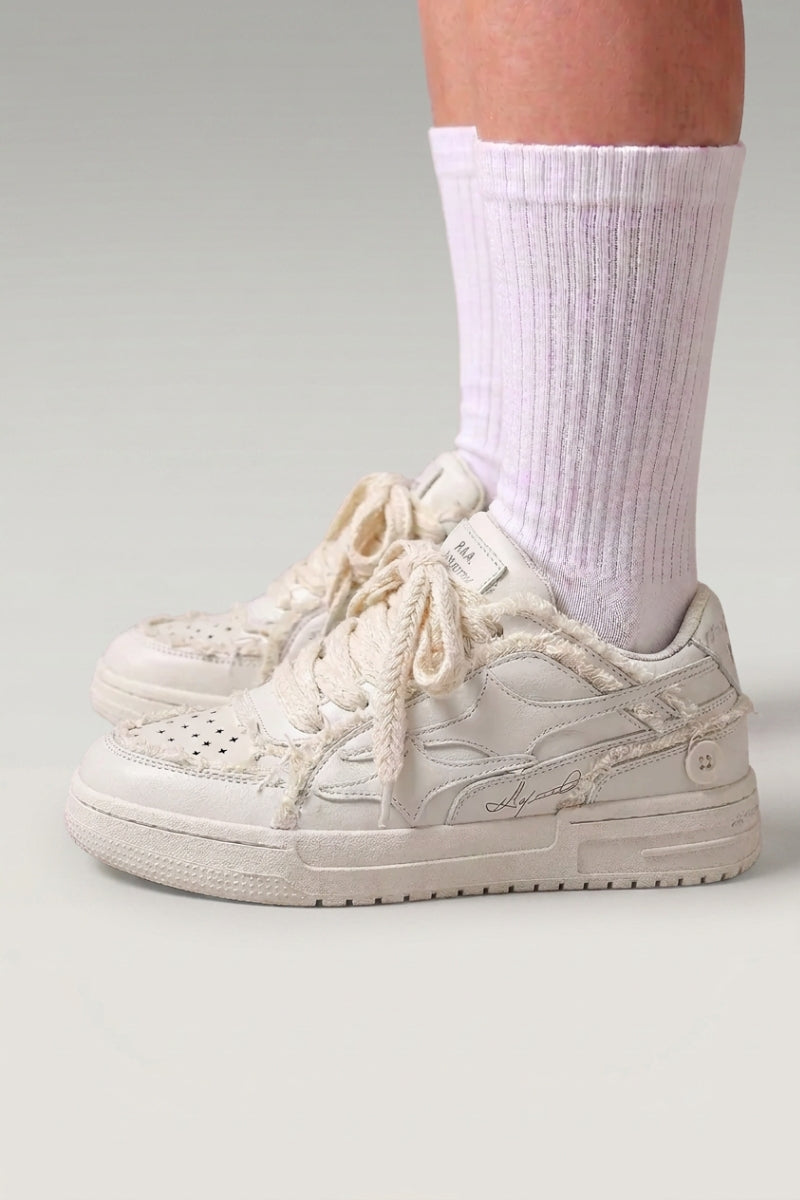 White premium Japanese sneakers 'Seiryu', worn on foot with white socks — Japanese streetwear style