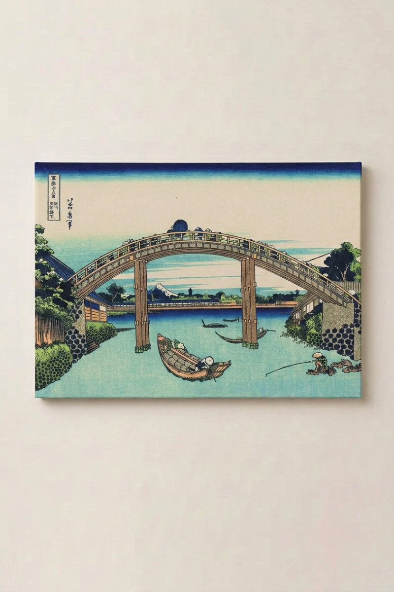 Traditional Japanese Print 'Hashi' — Japanese ukiyo-e-style print depicting the arched Fuji-view bridge over blue water with boats, ukiyo-e canvas print, shown on a wall