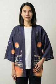Furisode kimono Shizuka, front view: open jacket with three-quarter sleeves in a graduated sunset-to-night-blue print