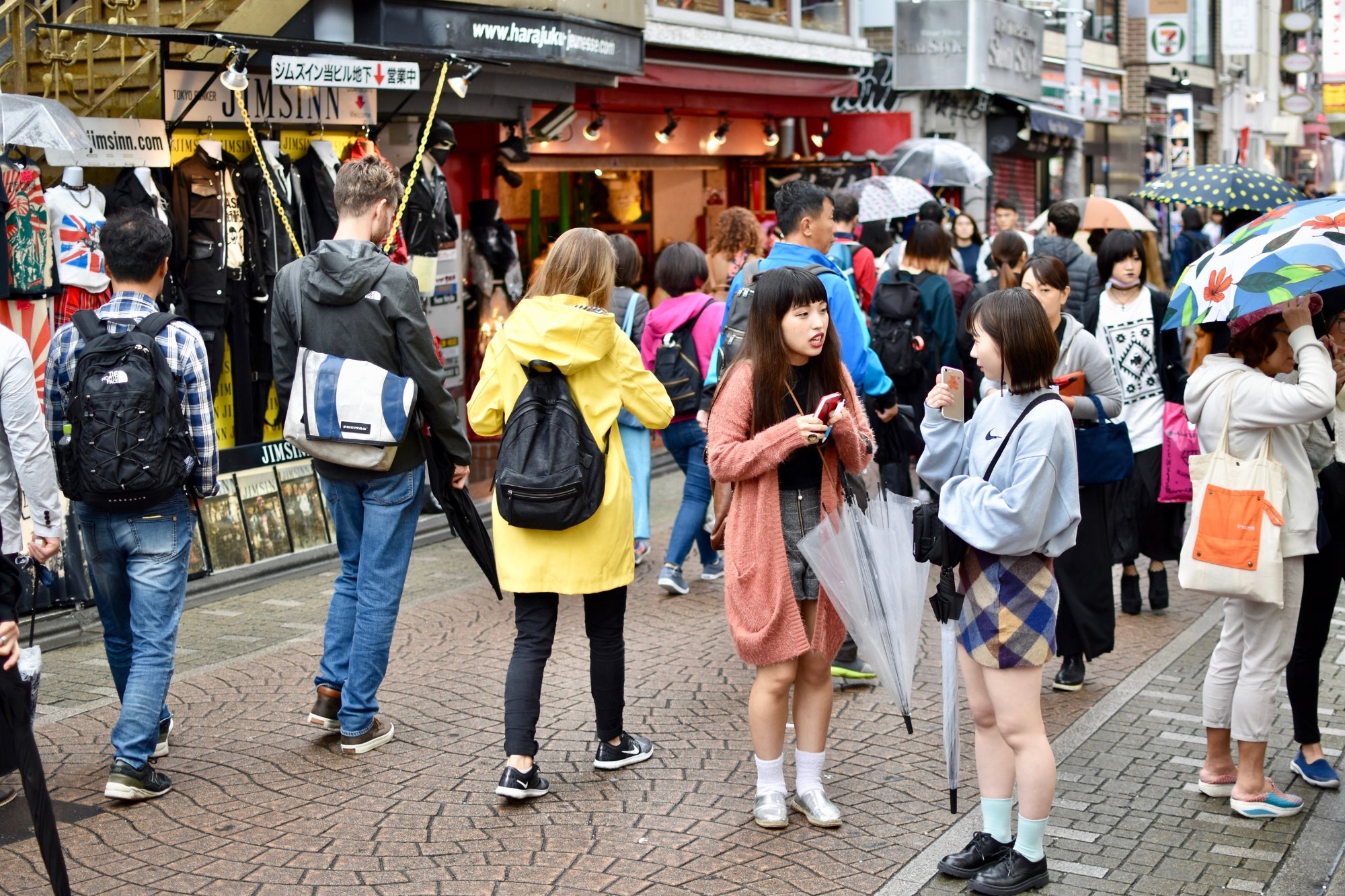 Street scene in Harajuku, Tokyo, where young people express Japanese urban fashion with colorful outfits and individuality — featured in the Japan Clothing Lookbook.