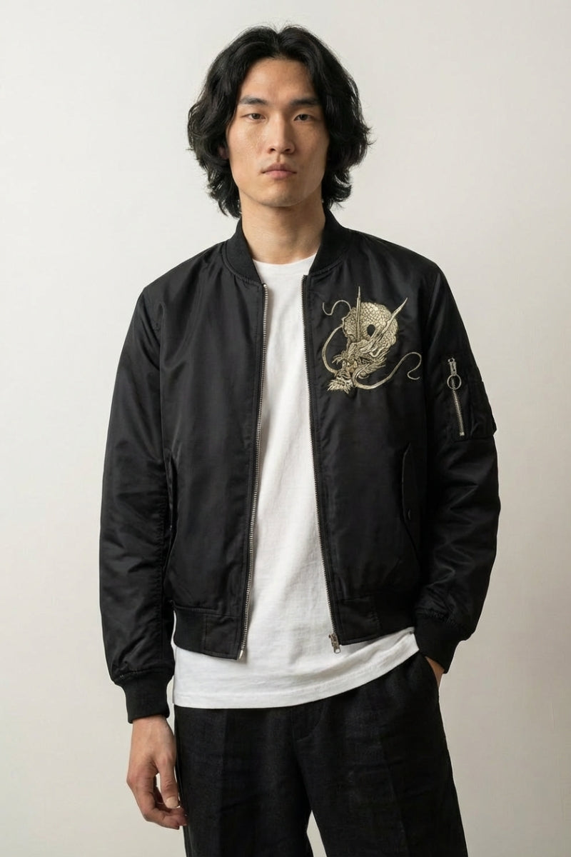 Japanese bomber 'Kaze no Tsugo' — all-black sukajan, detailed silver dragon's head embroidered