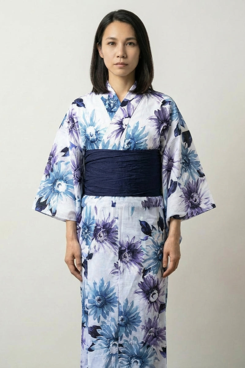 White Japanese kimono dress with blue and purple watercolor floral print and navy obi
