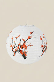 Japanese paper lantern — Japanese paper lantern, a white round paper lantern painted with red plum blossom branches
