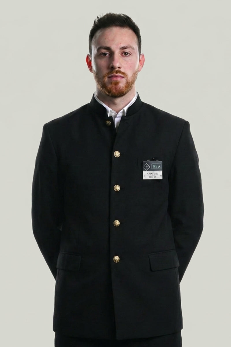 Japanese school uniform Classic Gakuran: black stand-collar jacket with a row of gold buttons worn over a white shirt with matching black trousers