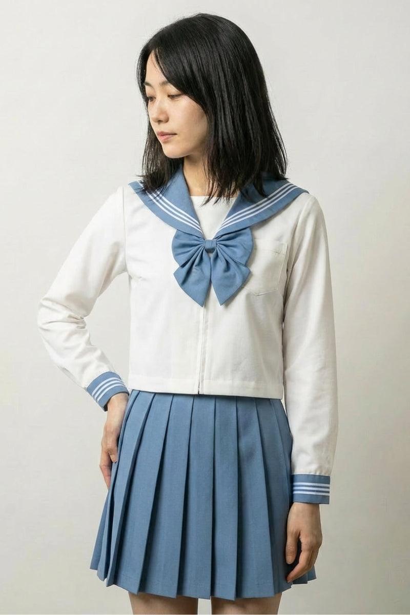 Japanese school uniform Sky Sailor: white top with a sky-blue collar lined in white, matching bow and sky-blue pleated skirt