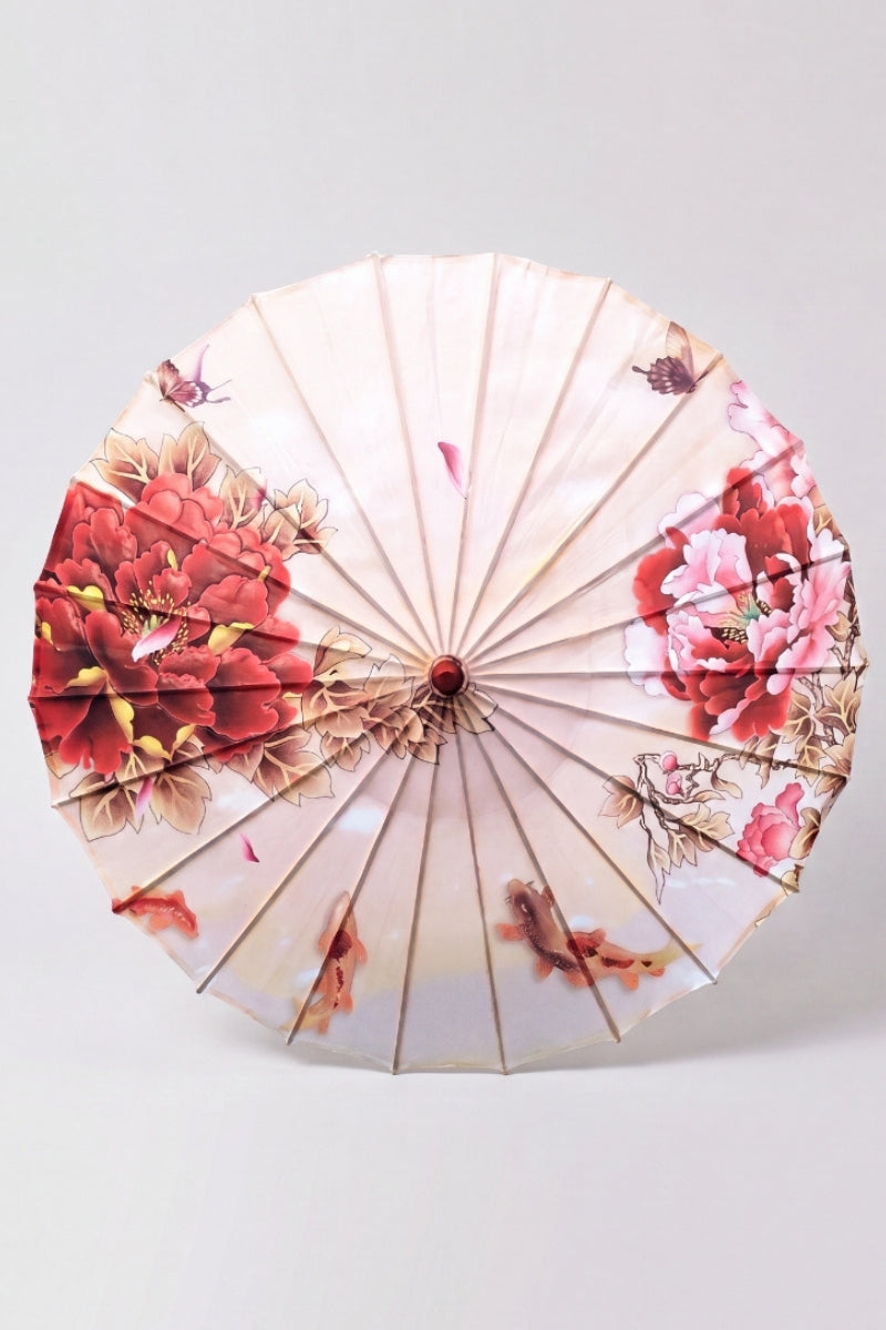 Traditional Japanese paper umbrella with red and pink peonies, butterflies and swimming koi on a cream canopy, shown open on bamboo ribs