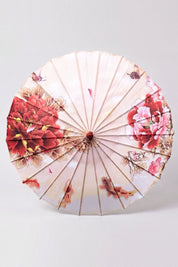 Traditional Japanese paper umbrella with red and pink peonies, butterflies and swimming koi on a cream canopy, shown open on bamboo ribs