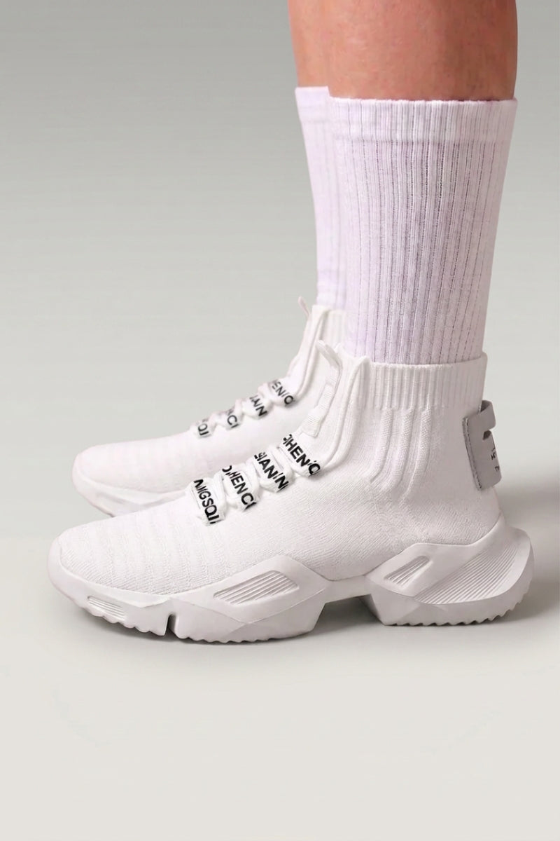 White Japanese high-top sneakers 'Kashiwa', worn on foot with white socks — Japanese streetwear style