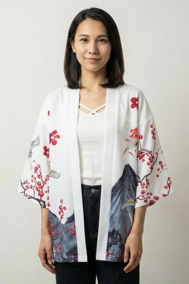 Lightweight kimono jacket Edo in white, front view: red plum blossom tumbling down one side over a satin-finish open front with three-quarter sleeves
