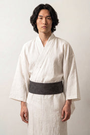 Charcoal gray obi belt with a soft heathered black-and-gray weave, worn over a white kimono