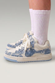 Blue minimalist Japanese sneakers 'Yuki', worn on foot with white socks — Japanese streetwear style