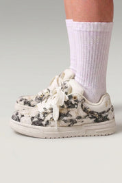 Gray minimalist Japanese sneakers 'Yuki', worn on foot with white socks — Japanese streetwear style