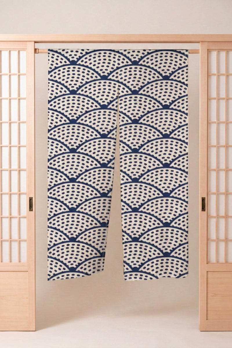 Japanese Noren 'Shima' — split doorway curtain printed with speckled navy seigaiha wave-arcs on cream, traditional Japanese room divider