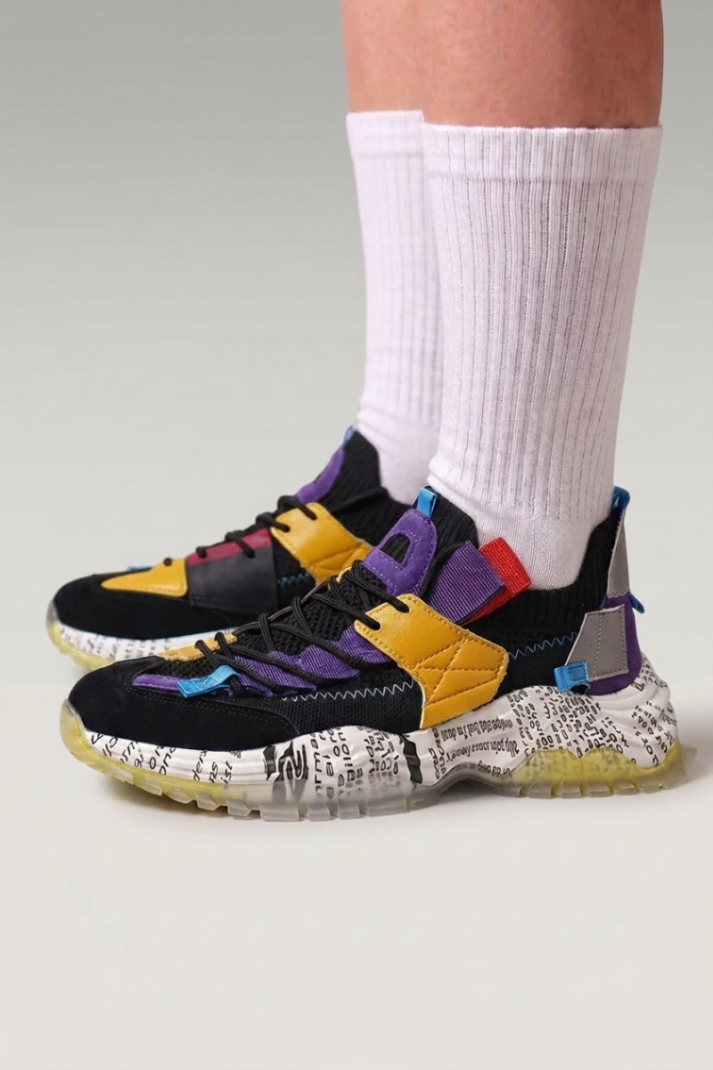 Black Japanese street sneakers 'Iwakura', worn on foot with white socks — Japanese streetwear style