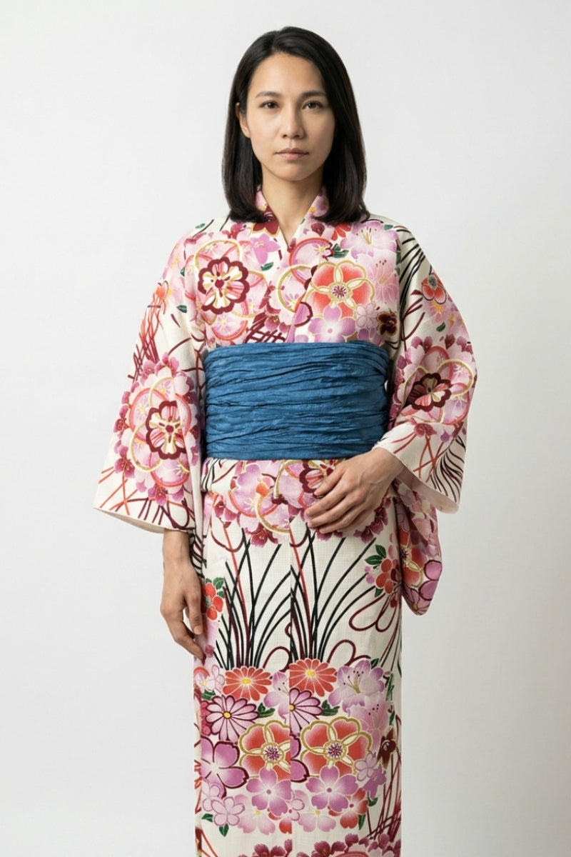 Cream Japanese kimono with pink and gold floral sakura print and blue obi belt