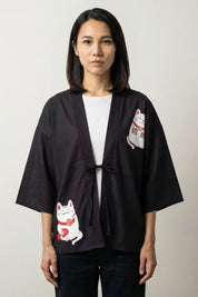 Maneki Neko kimono cardigan in black, front view: the beckoning cat motif on an open three-quarter sleeve cardigan