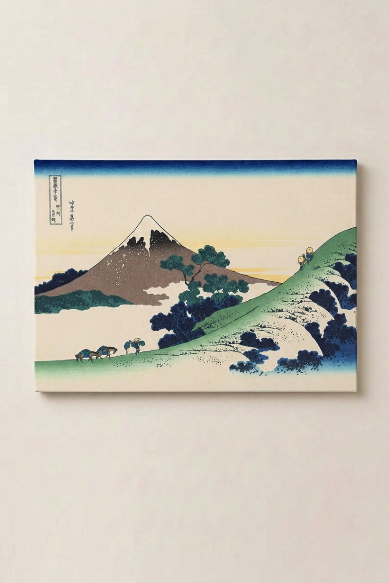 Japanese Print Landscape 'Okami' — Japanese ukiyo-e-style print depicting a serene red-brown Mount Fuji above a green valley and stream, ukiyo-e canvas print, shown on a wall