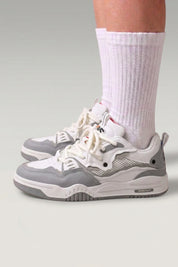 Grey Japanese sport sneakers 'Raijin', worn on foot with white socks — Japanese streetwear style