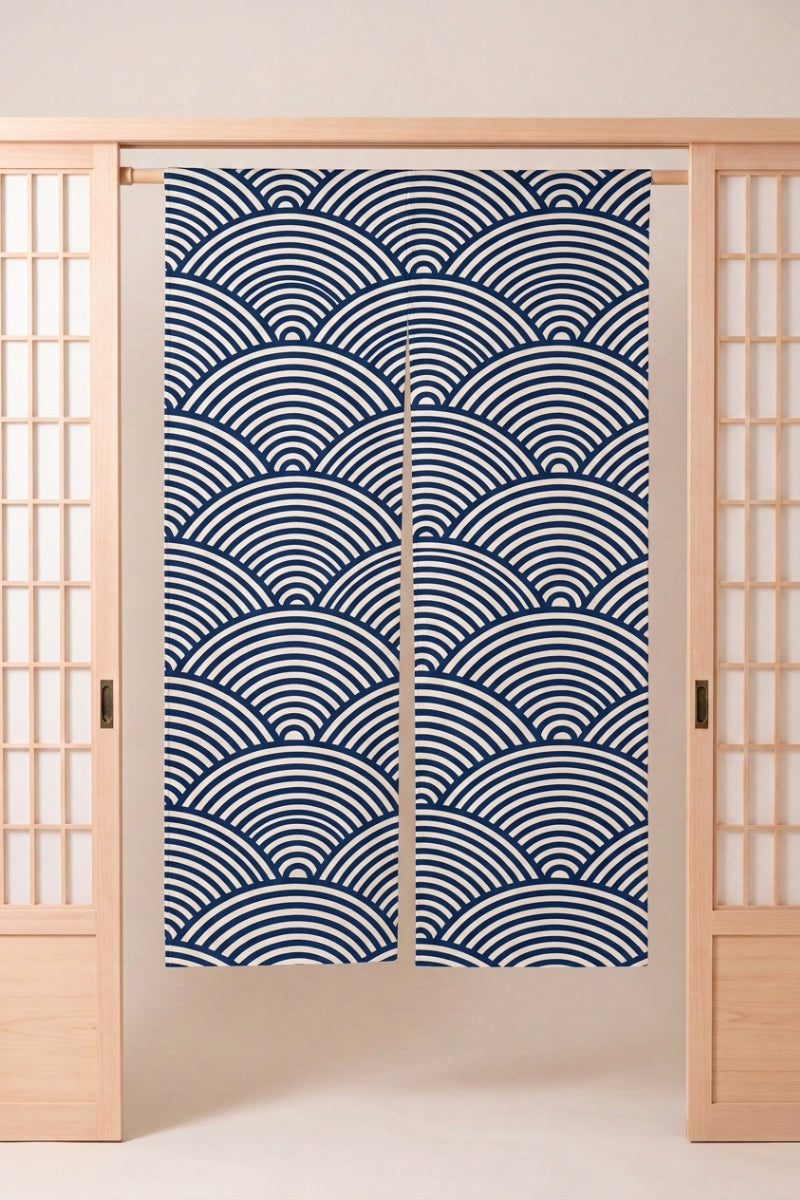 Japanese Noren 'Jikan' — split doorway curtain printed with the classic seigaiha overlapping wave-arc pattern in navy on cream, traditional Japanese room divider