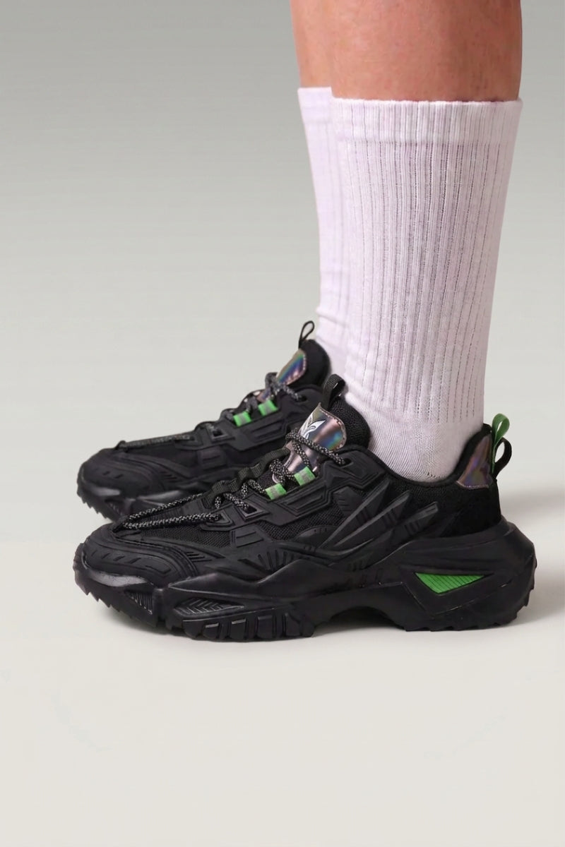 Black Japanese designer sneakers 'Shinshiro', worn on foot with white socks — Japanese streetwear style
