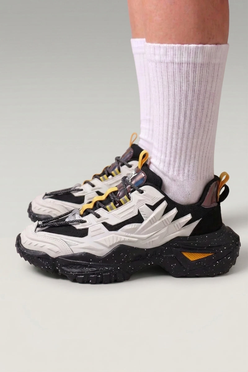 White Japanese designer sneakers 'Shinshiro', worn on foot with white socks — Japanese streetwear style