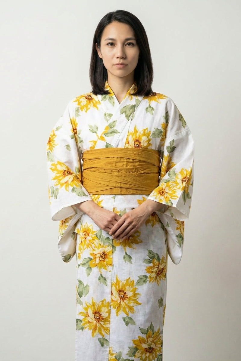 White Japanese summer yukata with watercolor sunflower print and mustard obi belt