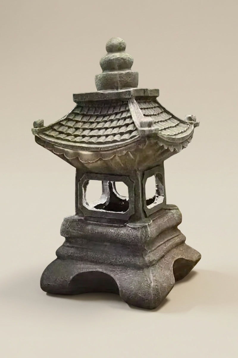 Traditional Japanese lantern — Japanese stone garden lantern, a dark bronze-finish stone garden lantern with a tiered pagoda roof