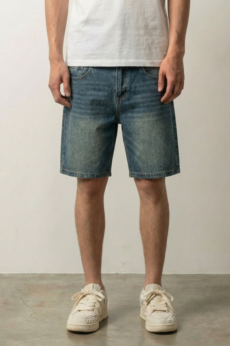 Faded vintage denim shorts styled look