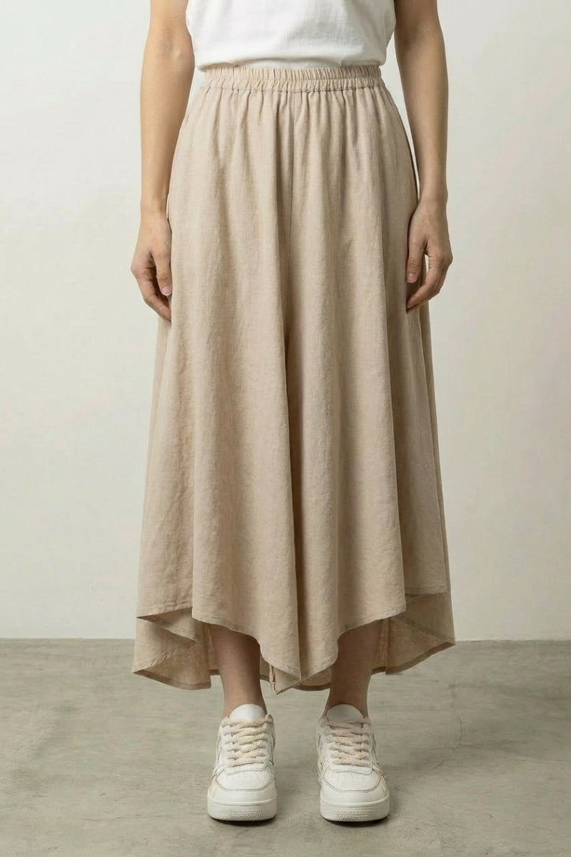 Beige hakama skirt for women in cotton-linen blend with asymmetric hem and elastic waist