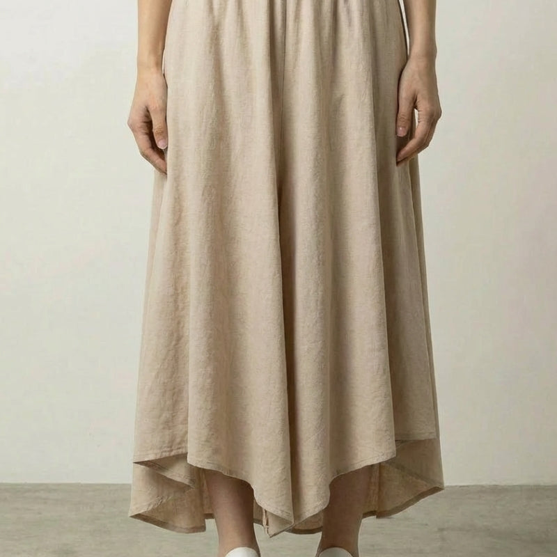 Beige hakama skirt for women in cotton-linen blend with asymmetric hem and elastic waist
