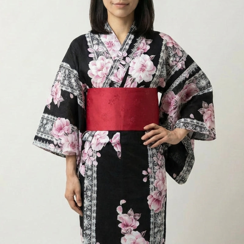 Black Japanese kimono for women with pink and white cherry blossom print and red obi belt